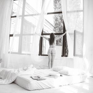 White Sunlight Room Solomiia Sokol Artem Tymoshenko 28 Boudoir Poses with Curtains